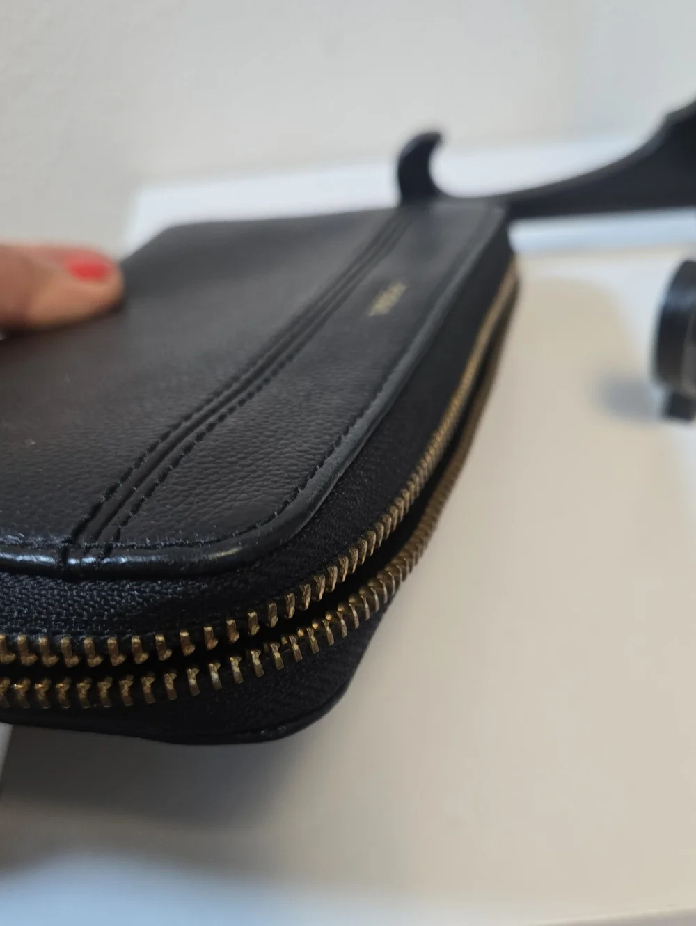 Fossil Black Leather Zip-Around Wallet with Gold Logo